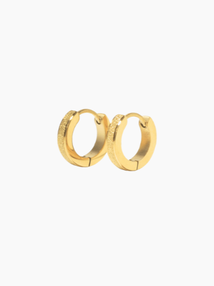Kadio made gold earring photo with white background